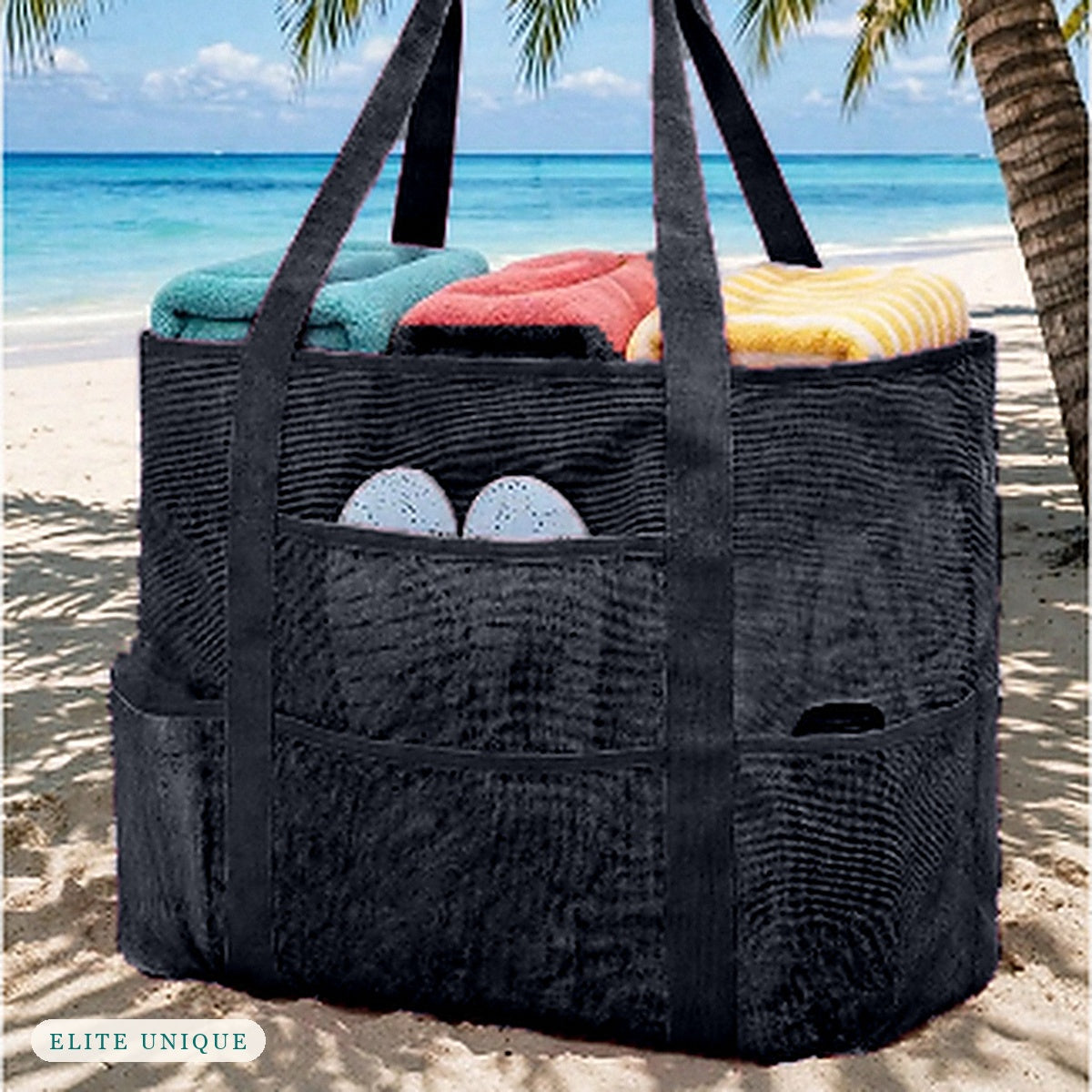 Large Mesh Beach Tote in black on the beach